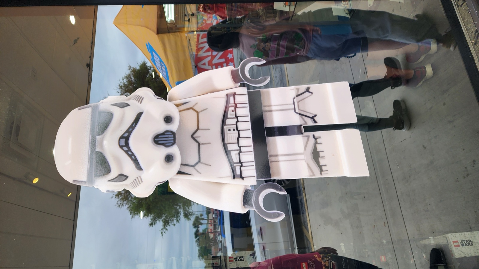 Giant Stormtrooper minifigure statue in the store window