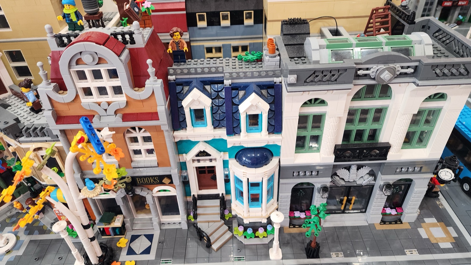 Close-up of the modular building row  -  Bookshop, blue townhouse, and more
