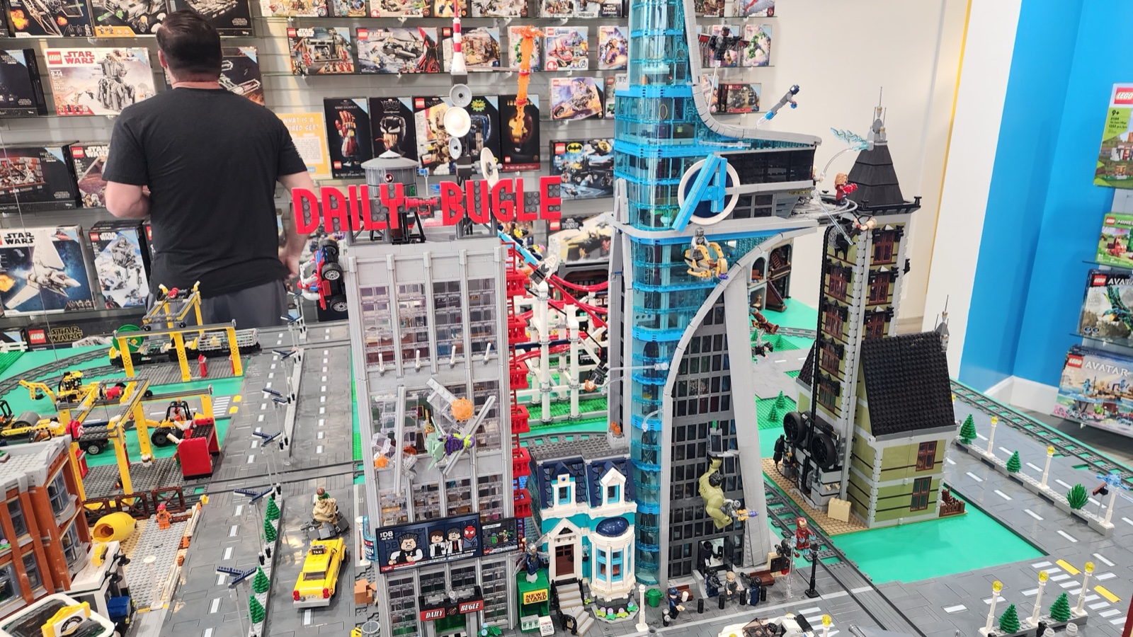 The Daily Bugle and Avengers Tower dominate the city skyline