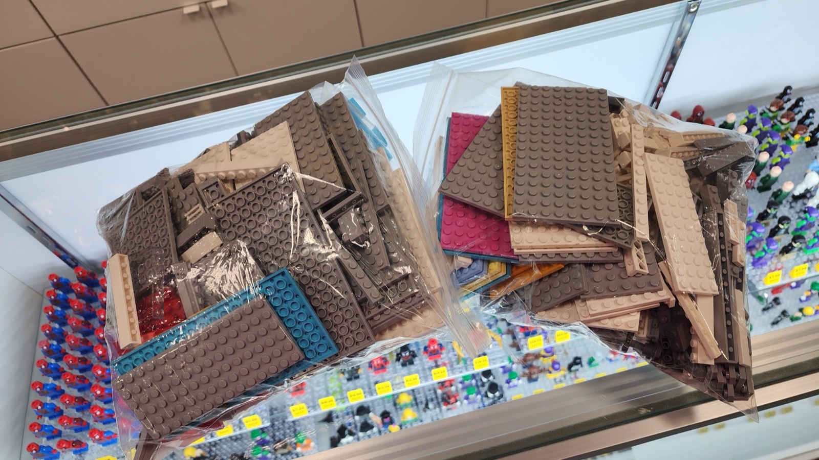 Two bags of gray and white plates from the bulk tables  -  hand-picked for the IMS Pagoda build